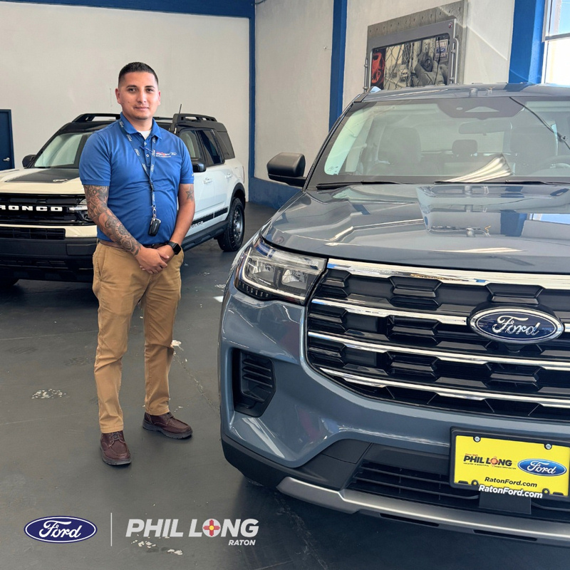 Louis Martinez with Phil Long Ford